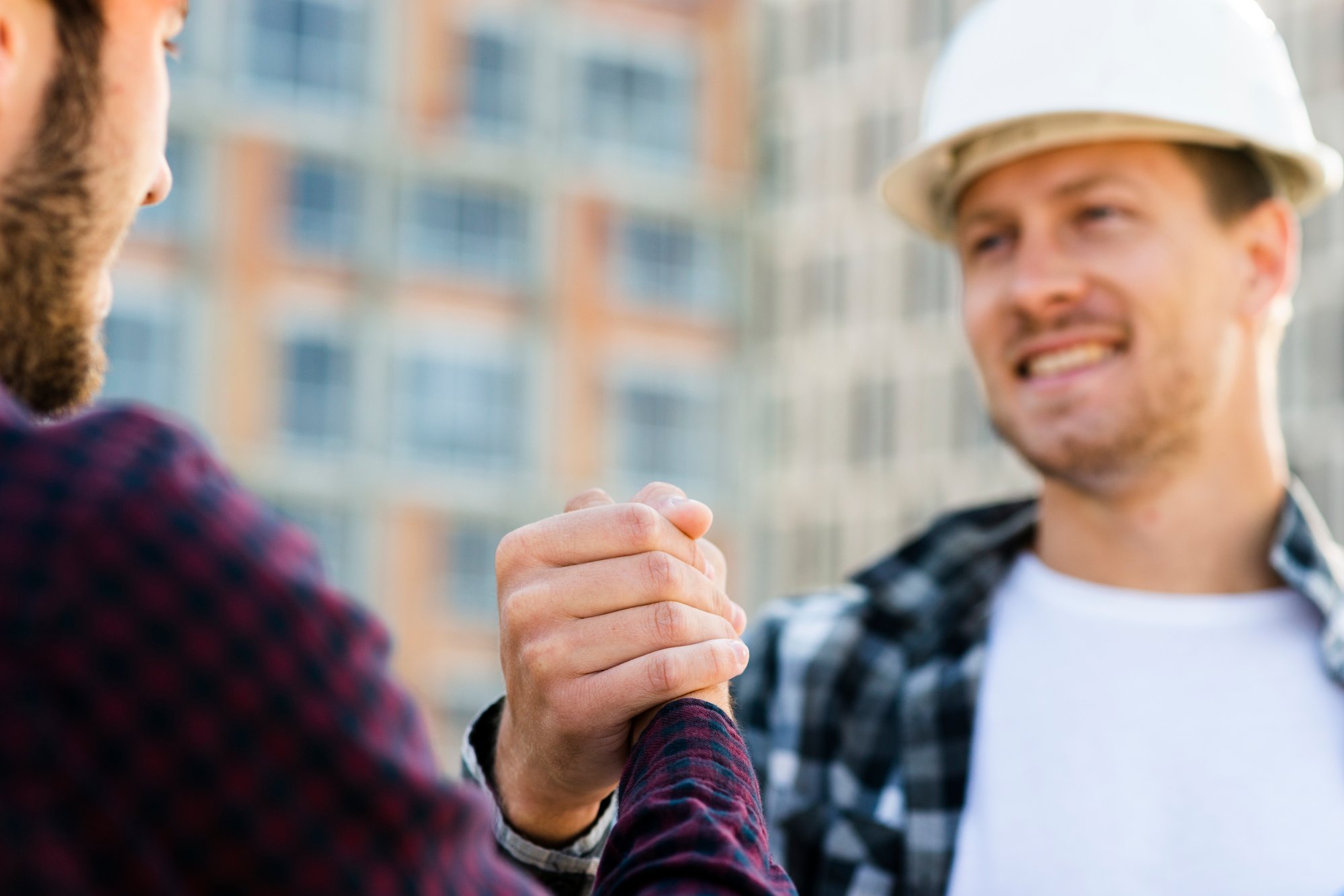 close-up-engineer-architect-shaking-hands (1)-1